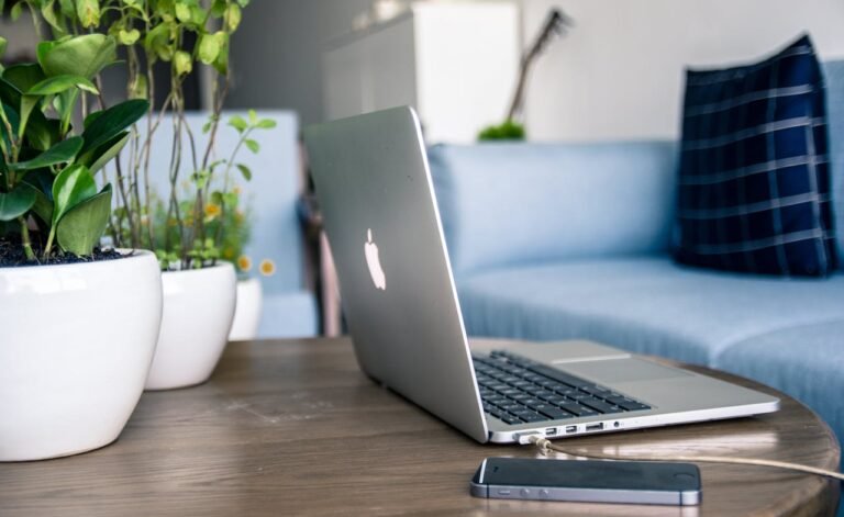 Laptop in comfortable space for individual online therapy in Texas, Oklahoma, and Nevada.